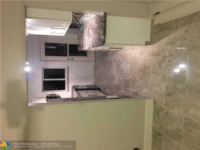 310 NW 54th Ct