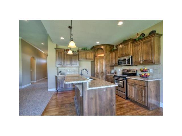 For Sale: 1694 NE Chapel Woods Dr Lees Summit, MO 64064