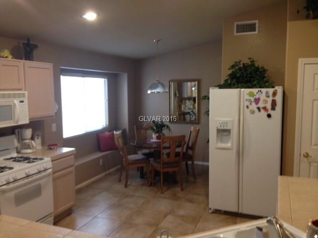 7693 Rainbow Cove Dr
