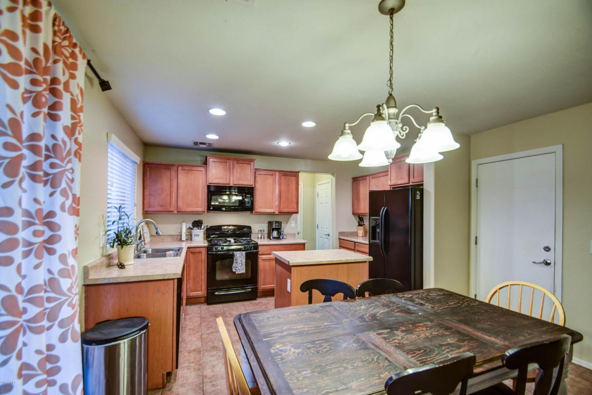 7884 W DESERT BLOSSOM Way, Florence, AZ 85132