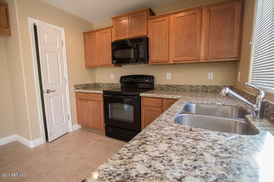 7913 W DESERT BLOSSOM Way, Florence, AZ 85132