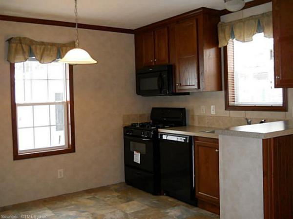 New England Village Homes 1950 North Broad St., #11Meriden, CT 06450