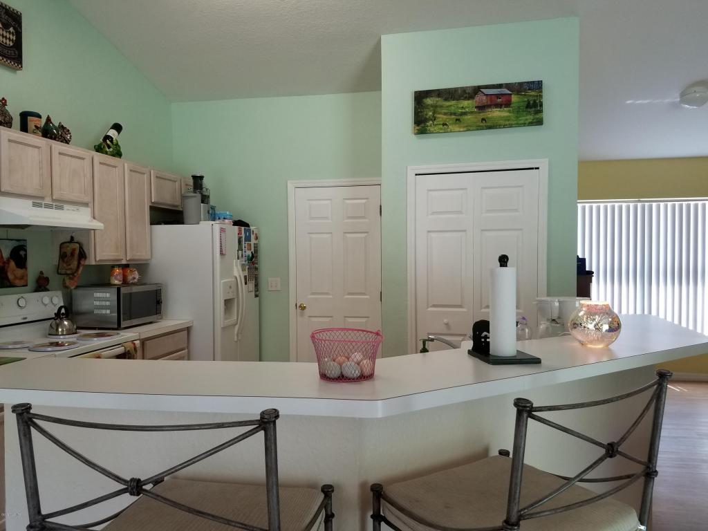25 Maple Course, Ocklawaha, FL 32179