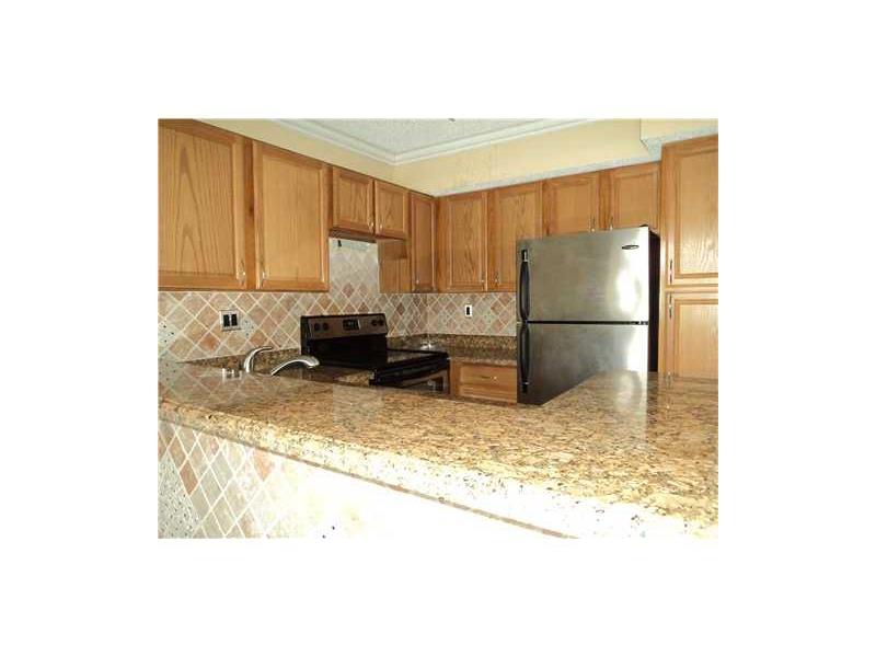 841 Lyons Road #24-104, Coconut Creek, FL 33063
