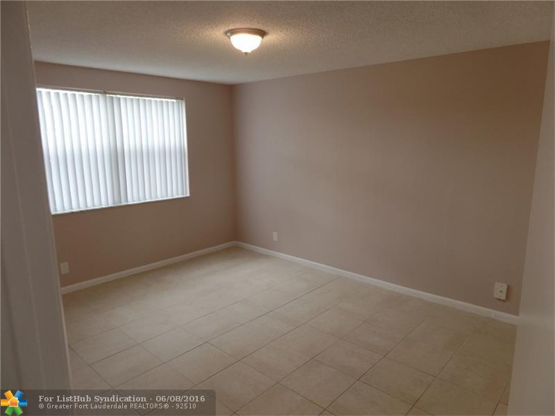 8977 Wiles Rd 103, Coral Springs, FL 33067