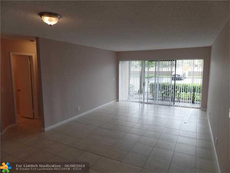 8977 Wiles Rd 103, Coral Springs, FL 33067