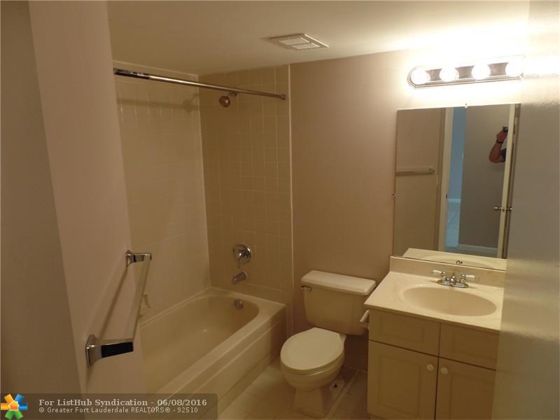 8977 Wiles Rd 103, Coral Springs, FL 33067