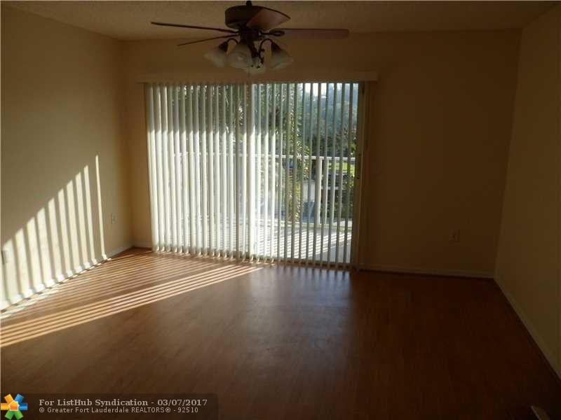 5045 Wiles Rd 201, Coconut Creek, FL 33073