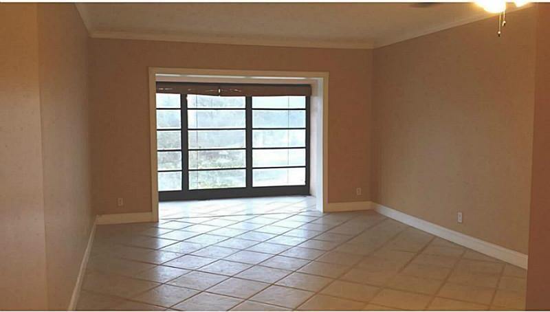 5011 W Oakland Park Blvd # 304, Lauderdale Lakes, FL 33313