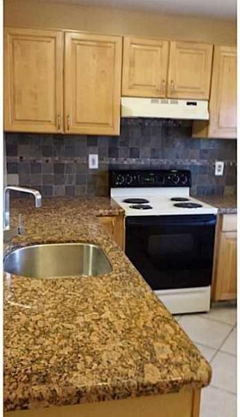 5011 W Oakland Park Blvd # 304, Lauderdale Lakes, FL 33313