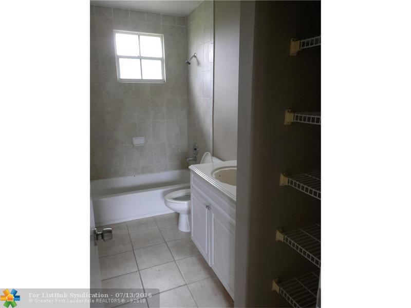 5840 Woodland Point Dr, Tamarac, FL 33319