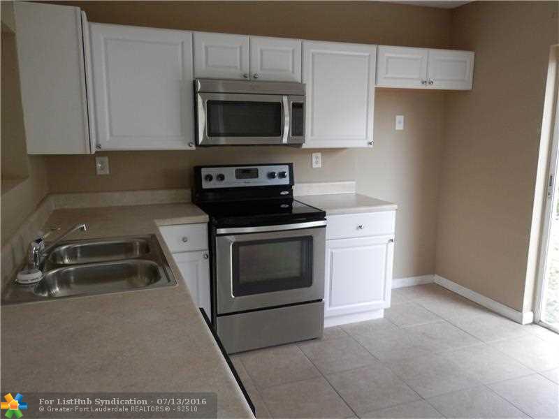 5840 Woodland Point Dr, Tamarac, FL 33319
