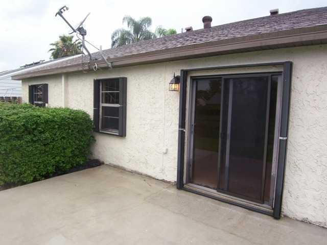 22963 Sandalfoot Boulevard, Boca Raton, FL 33428