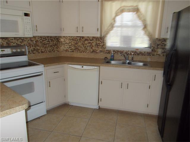 5 Regency CT, Lehigh Acres, FL 33936