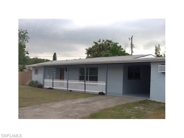 106 E Jasmine RD, Lehigh Acres, FL 33936
