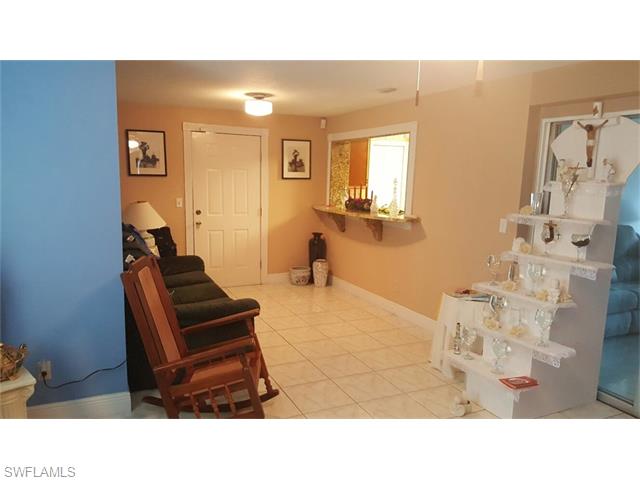 106 E Jasmine RD, Lehigh Acres, FL 33936