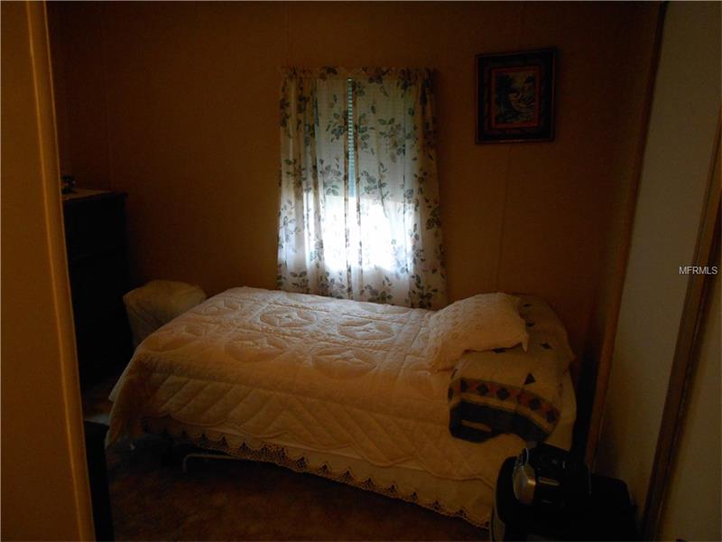 5561 WILLIAMSBURG LANE, Wildwood, FL 34785