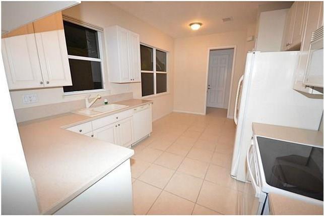 395 SW Walking Path, Stuart, FL 34997