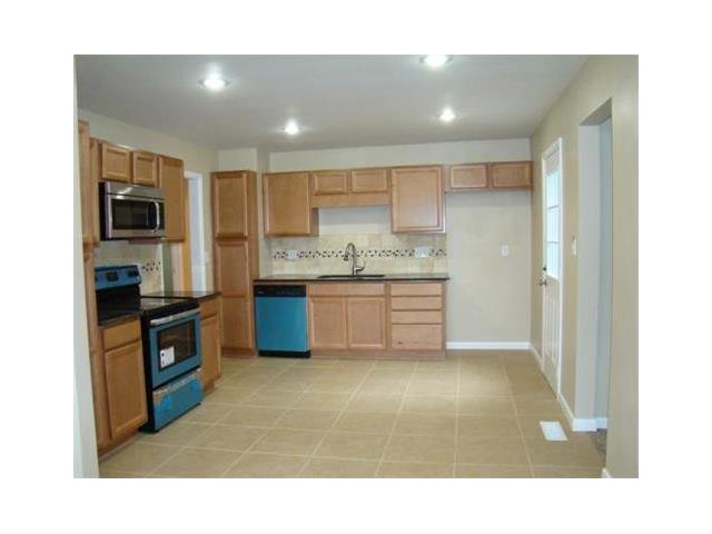 5601 NE Doniphan Lane, Village Of Oaks, MO 64118