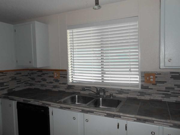 Tropicana Palms Manufactured Home Community6420 E. Tropicana Ave. #297Las Vegas, NV 89122