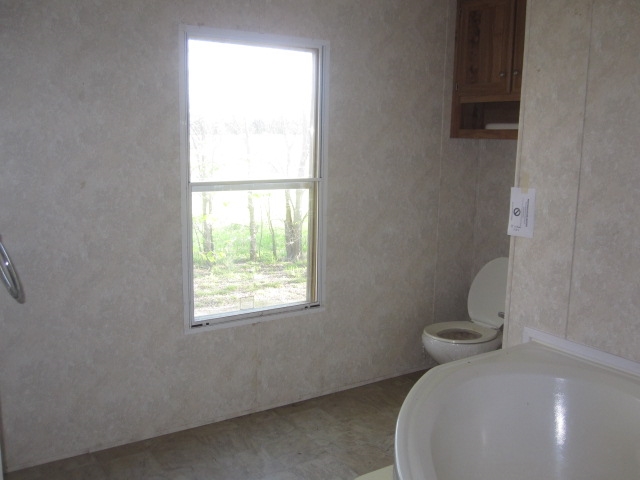 6069 E Flint Ln, Milburn, OK 73450