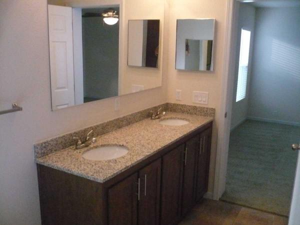 Friendly Village ,Sp, 5815 E. La Palma Ave., 65