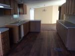 411 N NE LOOP323