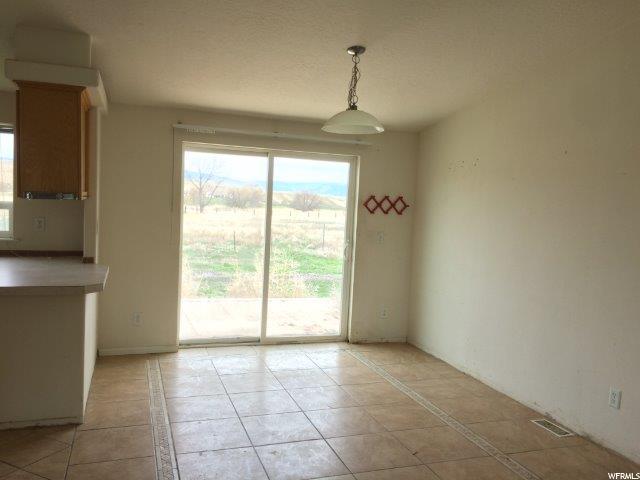 7633 E BRUSH CREEK RD S, Jensen, UT 84035