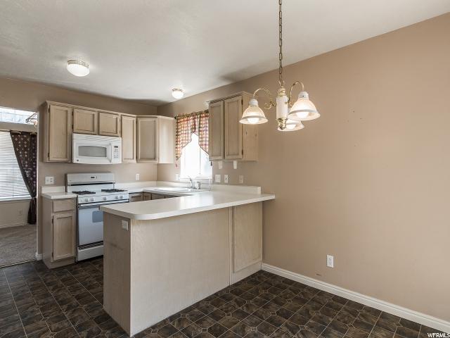 721 S COUNTRY CLUB DR W, Stansbury Park, UT 84074
