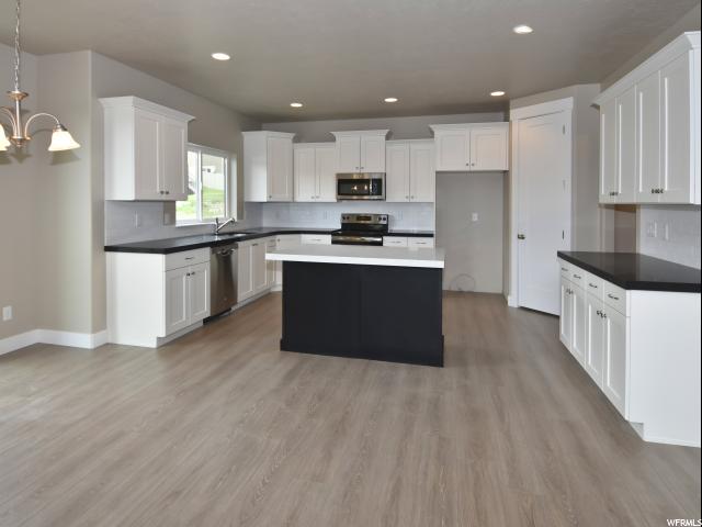 7789 N COBBLEROCK RD E, Lake Point, UT 84074