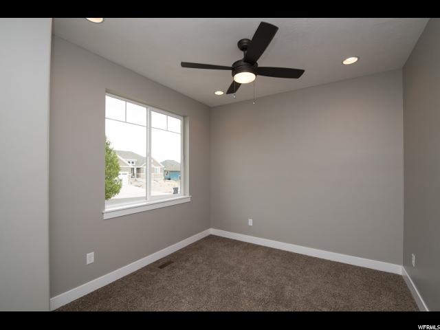 7787 N COBBLEROCK RD E, Lake Point, UT 84074