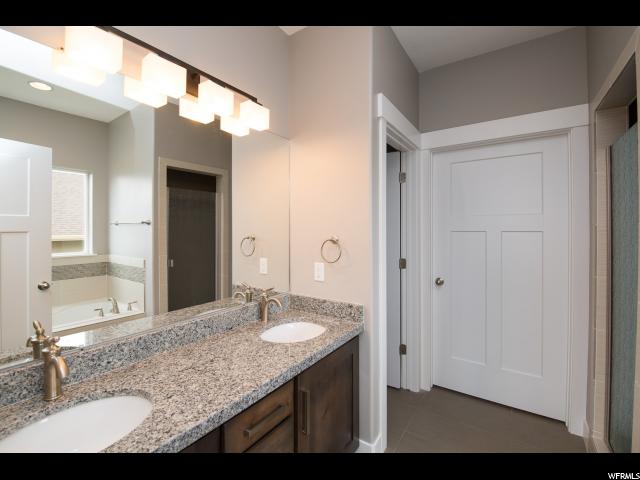 7787 N COBBLEROCK RD E, Lake Point, UT 84074