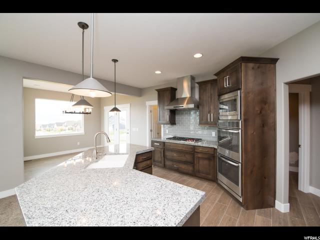 7787 N COBBLEROCK RD E, Lake Point, UT 84074