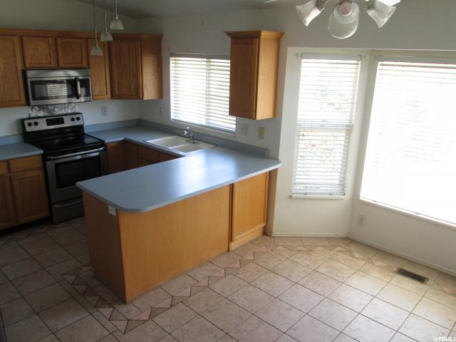 4571 S BRANDY WOOD DR W, West Valley City, UT 84120