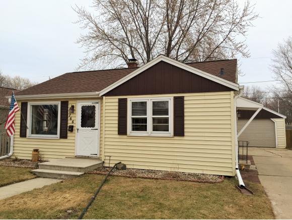 111 S John St